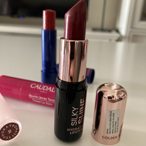 Lipsticks and lip balm used, branded set