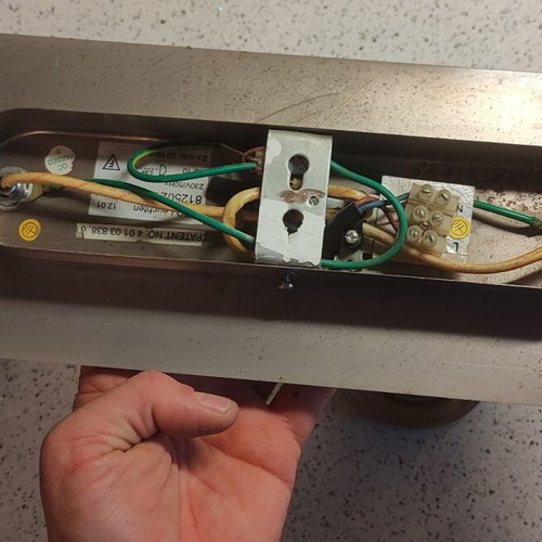 Ceiling light used with adjustable spotlights