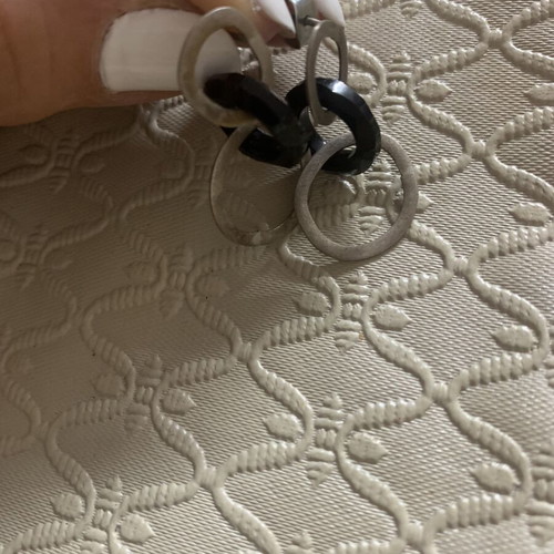 Earrings with interlocking rings like new, black and silver