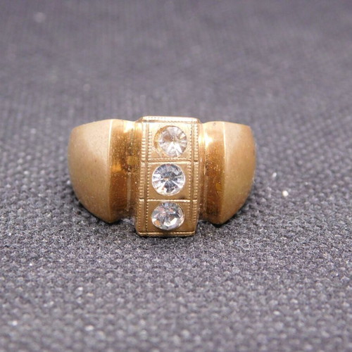 Brass ring with 3 zircon stones