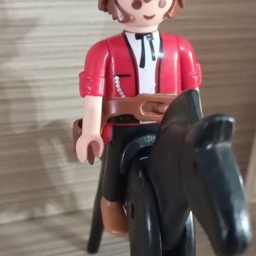 Playmobil cowboy with horse used