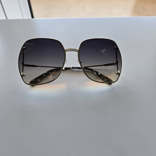 Salvatore Ferragamo sunglasses new, gold color