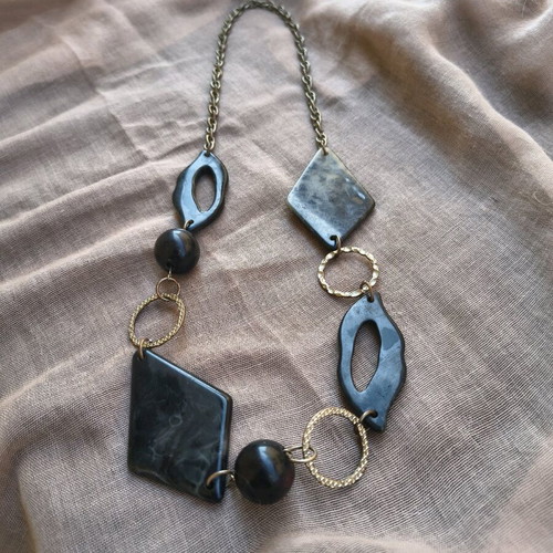 Necklace with black elements like new, modern statement jewelry