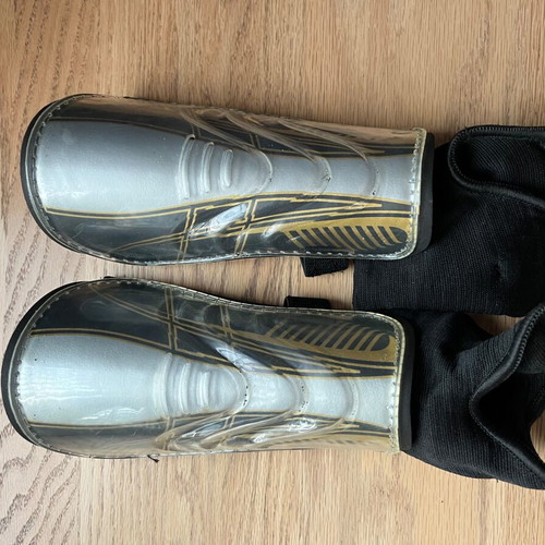 Football shin guards used with ankle protection, size M