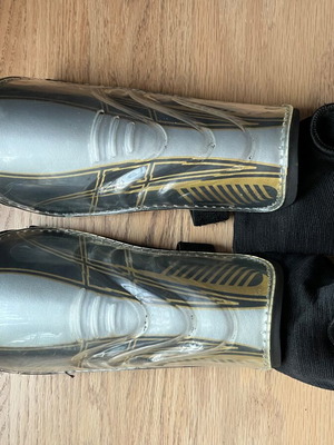 Football shin guards used with ankle protection, size M
