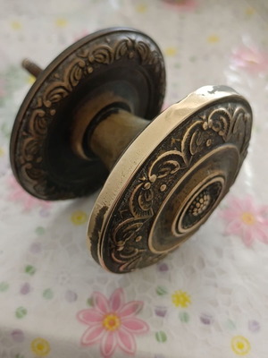 Brass door knob used, round vintage