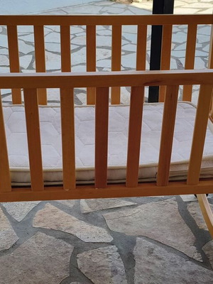 Wooden Baby Cradle rocking, like new with mattress