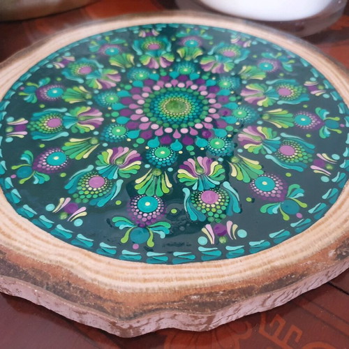 Handpainted wooden decorative plate with mandala design