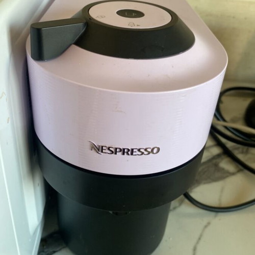 Nespresso coffee maker used, works with capsules