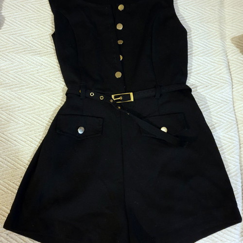 Black short jumpsuit with gold buttons and belt