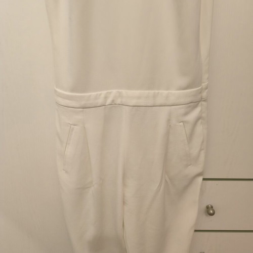 Zara white jumpsuit with open back, slim fit, pockets