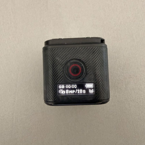 GoPro HERO4 Session action camera used with accessories and head strap
