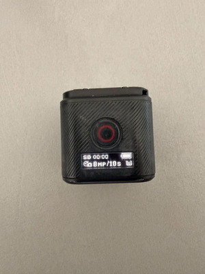 GoPro HERO4 Session action camera used with accessories and head strap