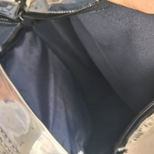 City Mirror Effect Backpack like new, silver by Lyc Sac