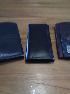 Key wallets used, black and two-tone brown leather, set of 3 pieces