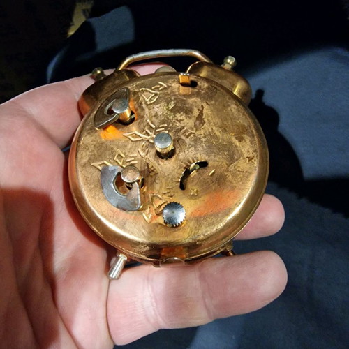 Winding table clock used for repair