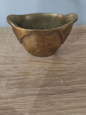 Vintage brass miniature vessel with embossed design