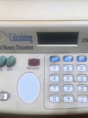 Calculating Counterfeit Money Discerner used