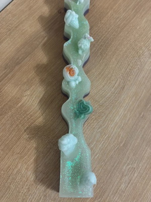 Easter candle handmade with glitter and sweet decoration