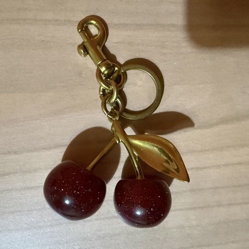 Cherry bag accessory or keychain new, red and gold