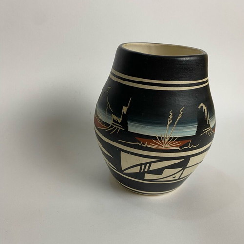 Vase with ethnic and geometric elements like new
