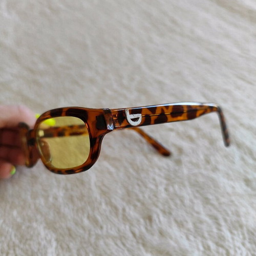 Vintage sunglasses like new with tiger frame and yellow lenses