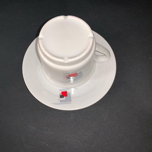 Ionia porcelain cup used with two saucers