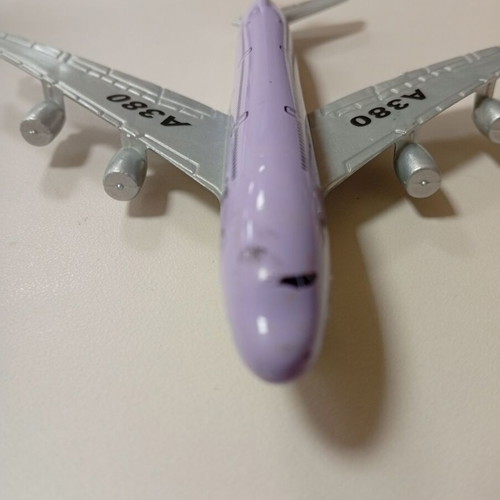 Small airplane miniature toy used