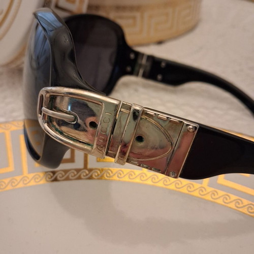 Gucci sunglasses used black with silver horsebit logo