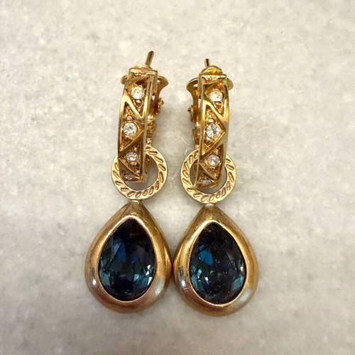 Vintage earrings used with blue stones and gold details