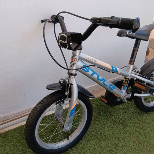 Boy's city bike silver with blue and orange designs like new with training wheels