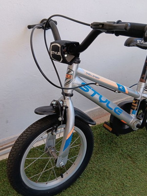Boy's city bike silver with blue and orange designs like new with training wheels