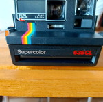 Polaroid Supercolor 635CL vintage instant camera used with strap