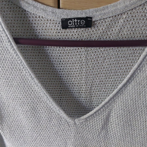 Oltre knitted sleeveless silver top like new, size Medium