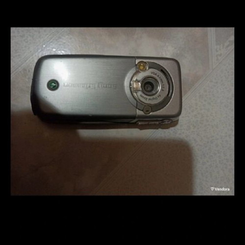 Old mobile phone used, no charger, unknown if working