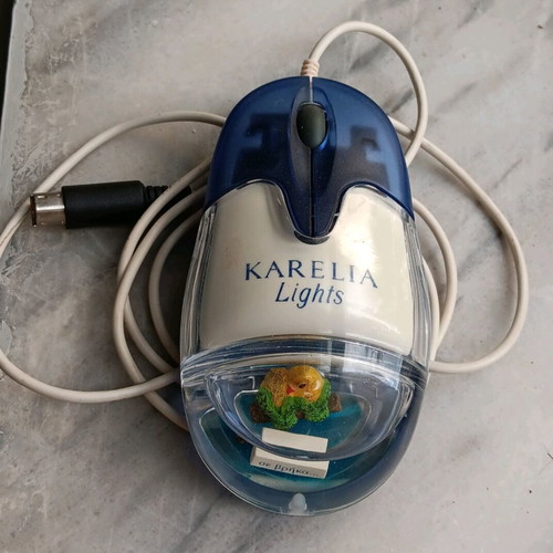Wired optical computer mouse used with Karelia Lights advertising theme