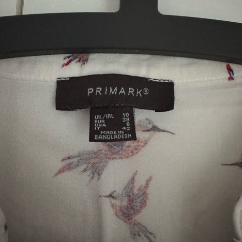 Sleeveless shirt like new with colorful birds, size M