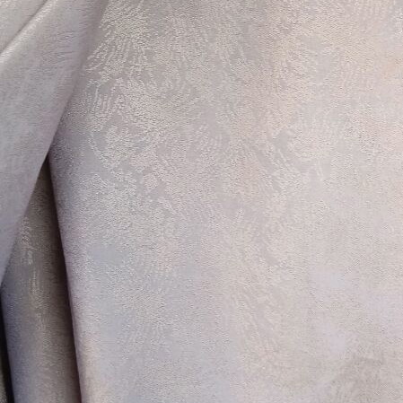Cape with hood and handmade knitted trim like new, beige