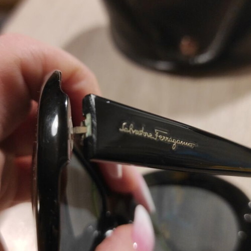 Salvatore Ferragamo sunglasses used, black with case