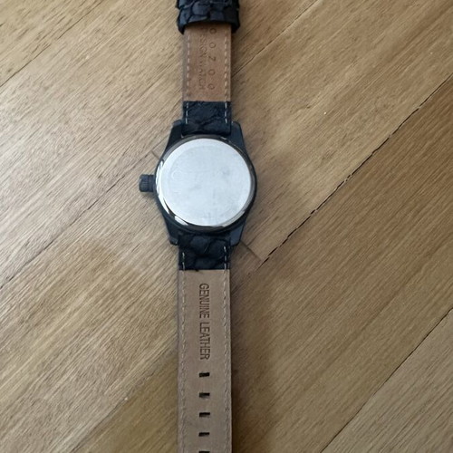 Oozoo black watch with textured strap and pink hands like new
