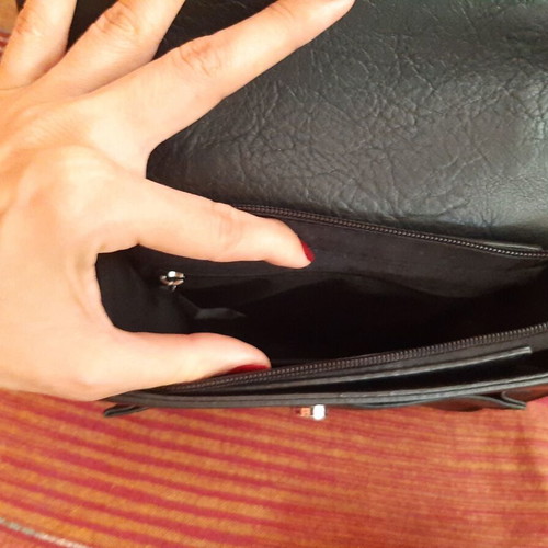 Black shoulder bag like new with detachable black and white strap
