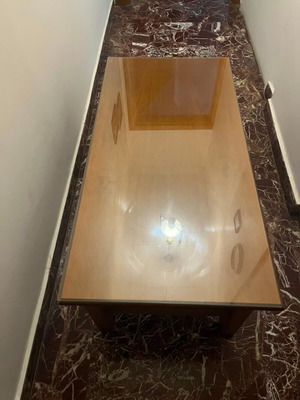 Coffee table with glass top, sturdy and ideal for home or student