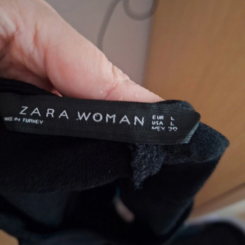 Zara jumpsuit like new, black with fringes at hem