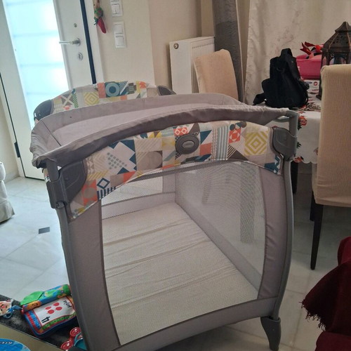 Grey playpen with changing table used