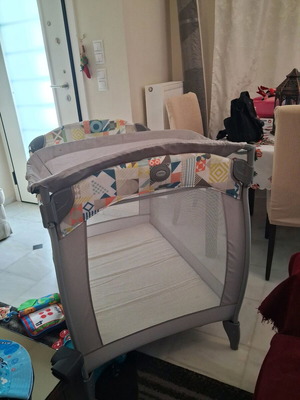 Grey playpen with changing table used