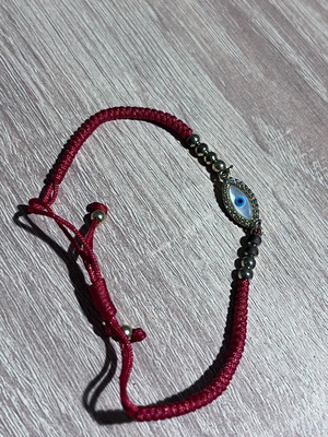 Red bracelet with eye like new