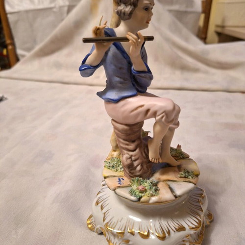 Capodimonte porcelain boy with flute like new with artist signature