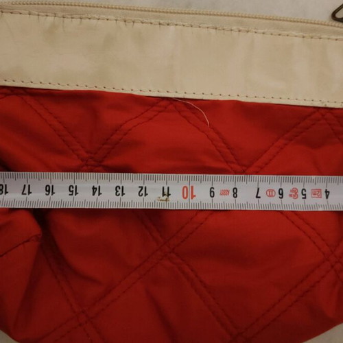 Toiletry bag used red with white stripe