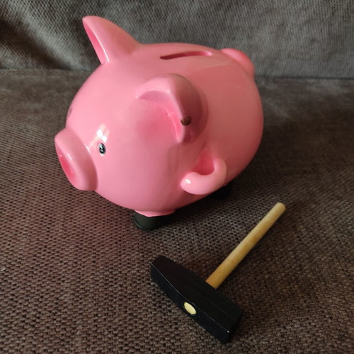 Ceramic piggy bank with hammer like new