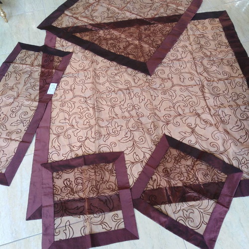 Tablecloth set of five pieces iridescent dark brown, silk organza with embossed flowers and border